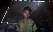Workers are carrying boiling metal to build propeller for ship in Dhaka, Bangladesh, Septe...