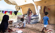 A Syrian family in a tent where 8 family members live since 2015. Maniza, Turkey, august 2...