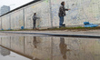 A view of an ongoing renovation works at the part of The East Side Gallery, an internation...