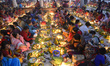 Bangladesh Hindus community people with light candle gather to celebrate a religious Hindu...