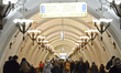 people are walking in the metro of the Russian capital of Moscow on November 26, 2016 