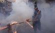 Revellers take part in the battle of 'Enfarinats', a flour fight in celebration of the Els...