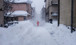 A man walks in Pescopenataro during an heavy snowfall in Pescopenataro (IS), Molise, Italy...
