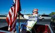 Sitting in the back of his Ford pick-up, Larry Shaak, of Harrisburg, PA., is seen dressed...