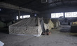 Inside the old abandoned Softex factory that has been converted to a refugee camp. There a...
