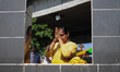 Woman hindu devotees perform the ritual bath near the river to perform religious rites dur...