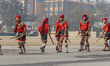 Nepalese people perform traditional stick dance during the function to mark the Democracy...