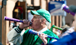 Counter protesters use party horns to overpower a bullhorn of a small group of religious p...