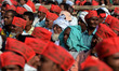 Indian supporters of Samajwadi Party gather to listen Uttar Pradesh state  Chief Minister...