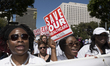 Supporters of the Affordable Care Act participate in a "Save Obamacare" rally in Los Angel...