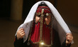 Bedouin girls wears traditional dress during Folklore Exhibition in Gaza city, Palestine,...