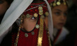 Bedouin girls wears traditional dress during Folklore Exhibition in Gaza city, Palestine,...