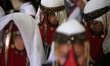 Bedouin girls wears traditional dress during Folklore Exhibition in Gaza city, Palestine,...