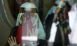 Bedouin girls wears traditional dress during Folklore Exhibition in Gaza city, Palestine,...