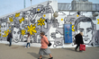 A mural '10 April 1943 - the Anniversary of the Uprising in the Warsaw Ghetto' seen near t...