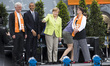 Former US President Barack Obama (2L), German Chancellor Angela Merkel (C) and chairman of...