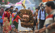 Nepalese people offering ritual prayer during celebration of Bhoto Jatra festival at Jawal...