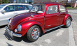 A classic, renovated Volkswagen Beetle car is seen in the old center of the city on 28 May...