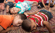 Children sleeping at a refugee shelter in the center Gaza.  Child protection and psychosoc...