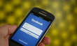 A smartphone with the Facebook login page is seen in this photo illustration on 29 June, 2...