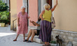 People are seen socialising in the village of Omisalj on the island of Krk in Croatia on 2...