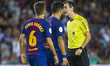 Denis Suarez, Luis Suarez and the referee during the match between FC Barcelona - Real Mad...