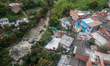 View of slums, or 'comunas' in low-income areas of Medellin, Colombia. Photo take from the...