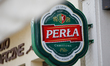 A sign advertising Perla beer (the largest independent Polish brewery) is seen  in Bydgosz...
