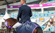 Swedish rider Peder Fredricson on H&M All In rides the lap of honor at Ullevi Stadium in G...