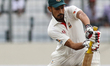 Bangladeshi cricketer Nasir Hossain plays a shot during the third day of the first Test cr...