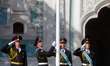 KIEV, UKRAINE - AUGUST 23: Honor Guard soldiers rise up a National Flag of Ukraine. 