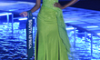 Ashanti Mbanga of South Africa dons her evening gown during the Miss Earth 2013 pageant's...