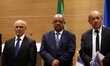 Algeria's Foreign Minister Abdelkader Messahel (C) and France's Minister for Europe and Fo...