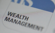 The Goldman Sachs Wealth Management application is seen on a mobile phone screen on Novemb...