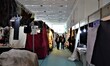 Visitors walk between stands at the 14th International Gifts and Handicrafts Fair in Ankar...