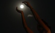 A girl frames by hands the full moon as it rising on Monday evening over the sky near the...