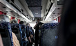 Don Gaetano, an italian priest, inside the bus on the road to Medjugorje talks with pilgri...