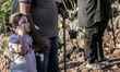 A girl with her father on a steep path that leads on the very place of the apparitions of...