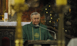 Father Jozef Parafiniuk is seen preaching during the Holy Mass in the Vincent de Paul basi...