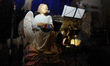 An angel sculpture is seen in the Vincent de Paul basilica during the Holy Mass on January...