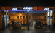 People are seen using a car wash near the Tesco supermarket in Bydgoszcz, Poland on Januar...