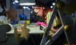A young lady decorates biscuits in a local shop selling traditional cakes.On Monday, Janu...