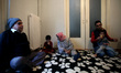 Laila Saleh (C), a 110 years old Syrian refugee born in Kobane on 1907, in an apartment  p...