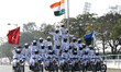 Indian army personel perform acrobatics on their bikes as they take part in a rehearsal ah...