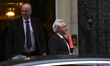 Britain's Transport Secretary Chris Grayling (L) and Britain's Secretary of State for Exit...