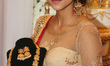 Tamil woman displays handmade exquisite traditional jewellery during a South Indian and Ta...