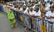 A Muslim Women cross the road at front of Police Barricade,India ruling   Bharatiya Janata...