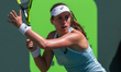 Defening Miami Open Champion Johanna Konta, from Great Britain, in action against Elise Me...