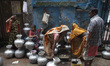 People collecting water from tubewell on a street at old Dhaka 