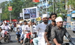  Indian Muslim activists hold placards during a protest calling for justice following the...